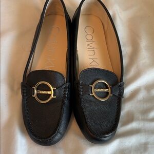 Calvin Klein Black Leather Flats with Gold Accents